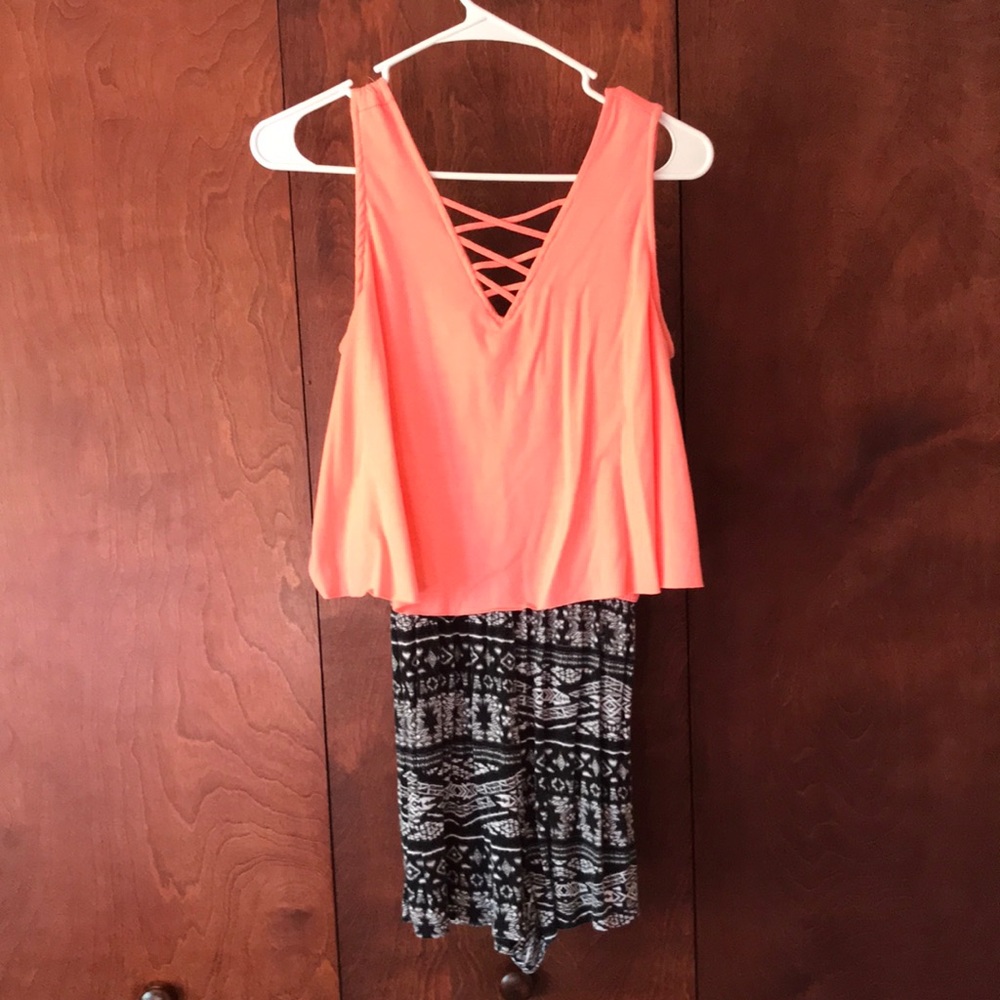 Peach and black/white patterned romper